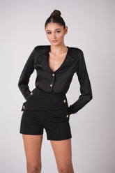 Criss-cross shorts with gold button details